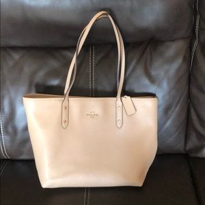 Tan coach city zip tote